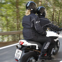 Riding A Motorcycle With A Passenger - MOTORESS